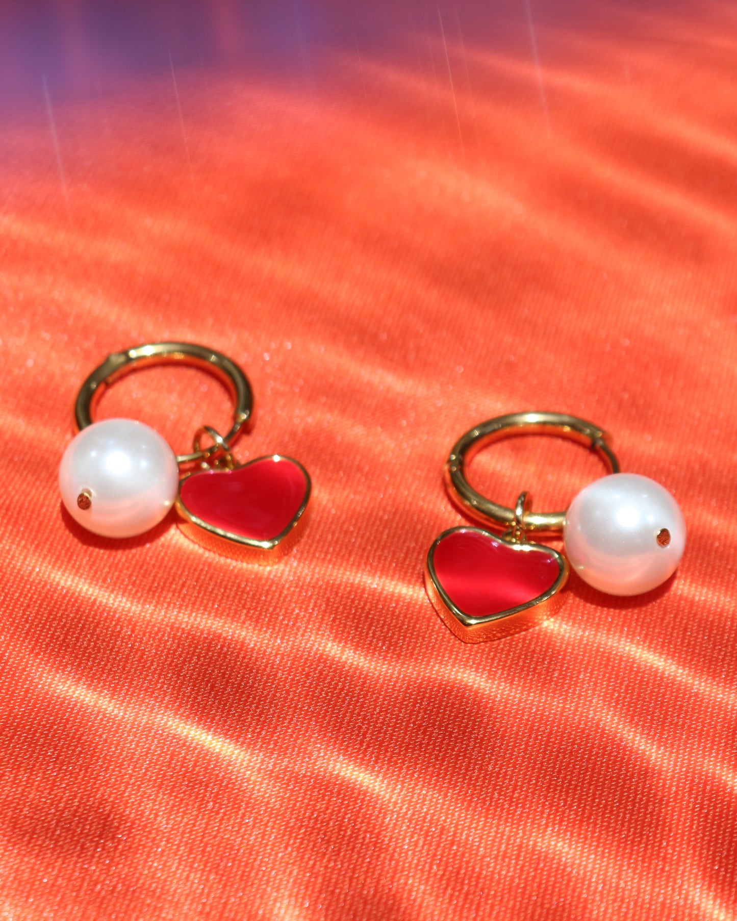 Argollas de perla y corazon