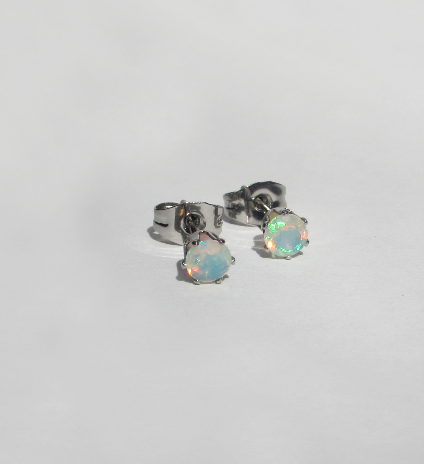 Aretes en acero inoxidable con Opalo