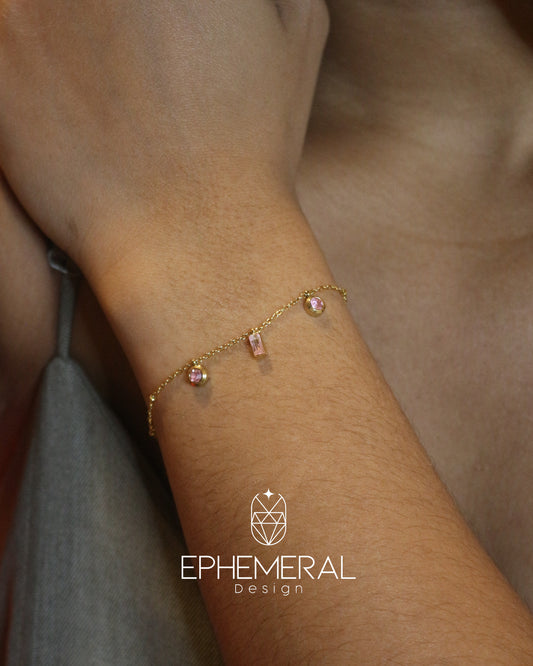 Pulsera de dijes rosa