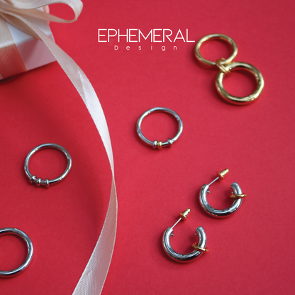 Aretes de acero con baño de oro 18k.