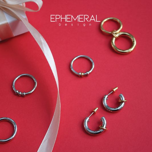 Aretes de acero con baño de oro 18k.